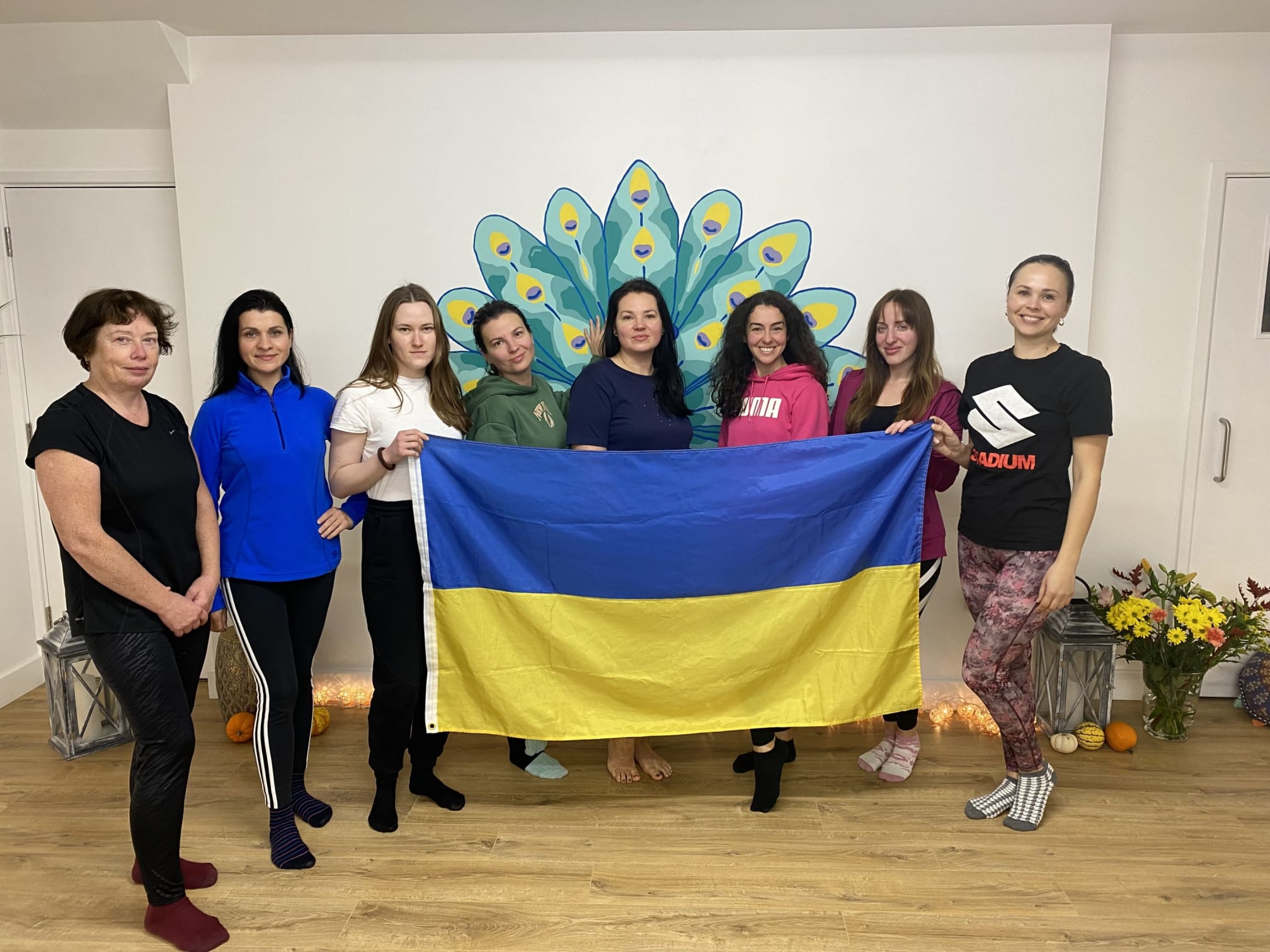 Ukrainian refugees ready for a yoga class